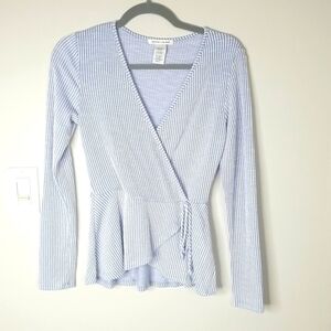 Caution to the Wind long sleeve v neck wrap top